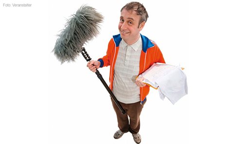 Moderator Alfons mit Mikrofo